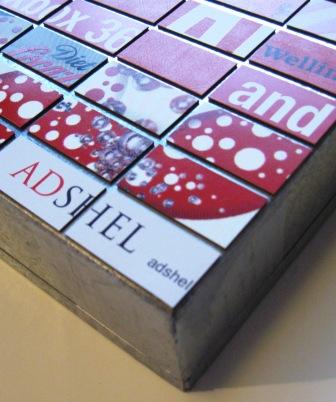 Adshel posters recycled into magnets to create artwork by recycled.co.nz